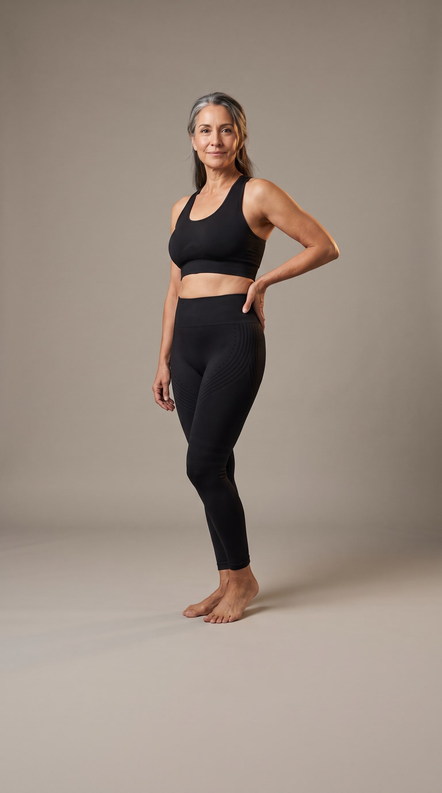 Woman wearing the Ionix Labs Sculpt seamless bra and the full-length Sculpt 3D Lift and Smooth Leggings